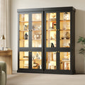 Modern freestanding cabinet with integrated LED mood lighting, glass display case, well-designed interior layout and anti-tip protection; stable, safe and versatile for home use; black