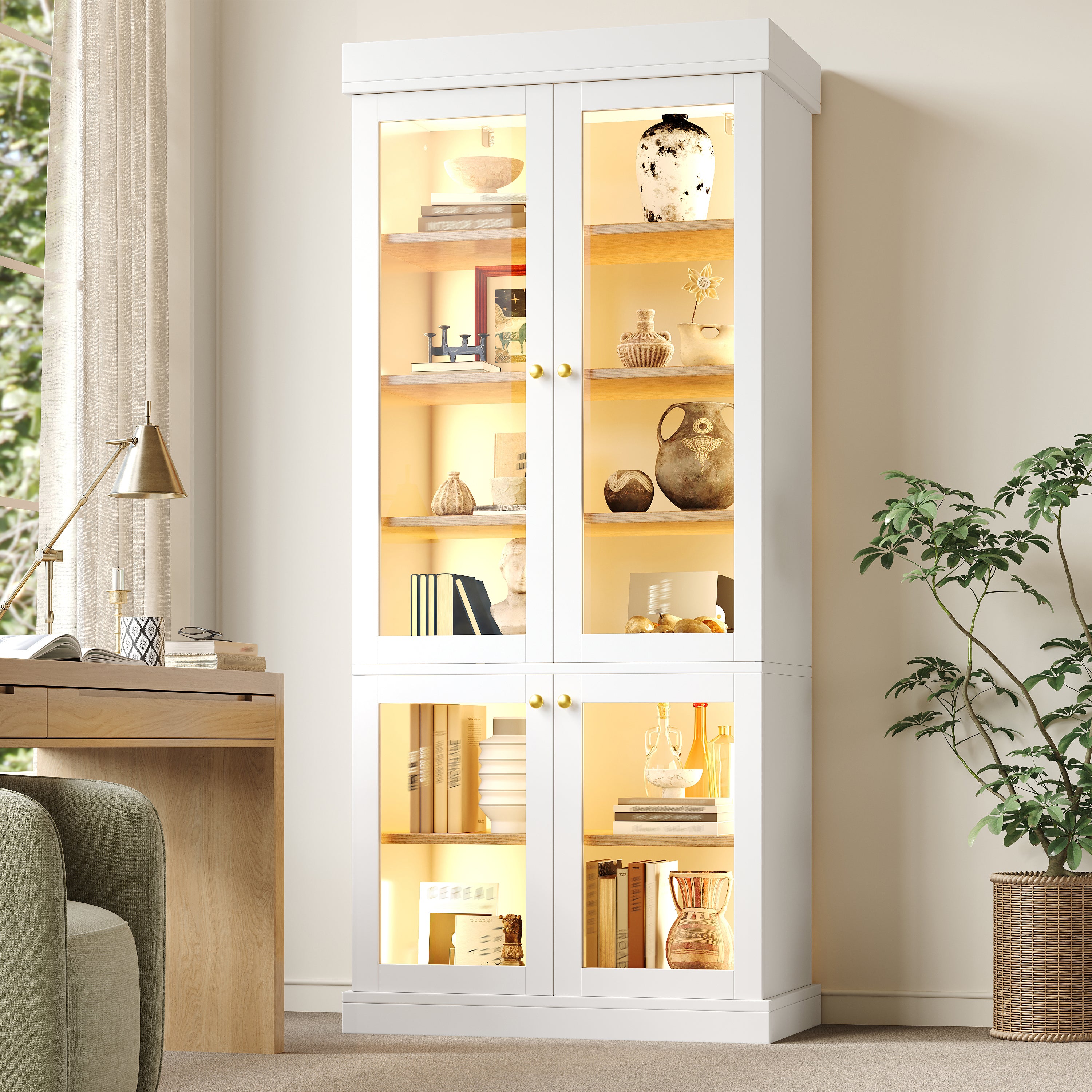 Modern freestanding cabinet with integrated LED mood lighting, glass display case, well-designed interior layout and anti-tip protection; stable, safe and versatile for the home; white.