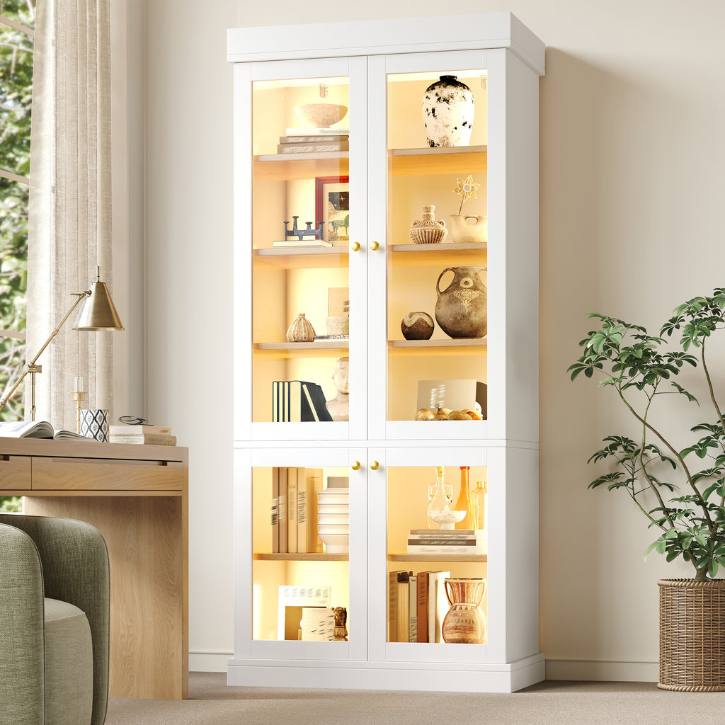 Modern freestanding cabinet with integrated LED mood lighting, glass display case, well-designed interior layout and anti-tip protection; stable, safe and versatile for the home; white.