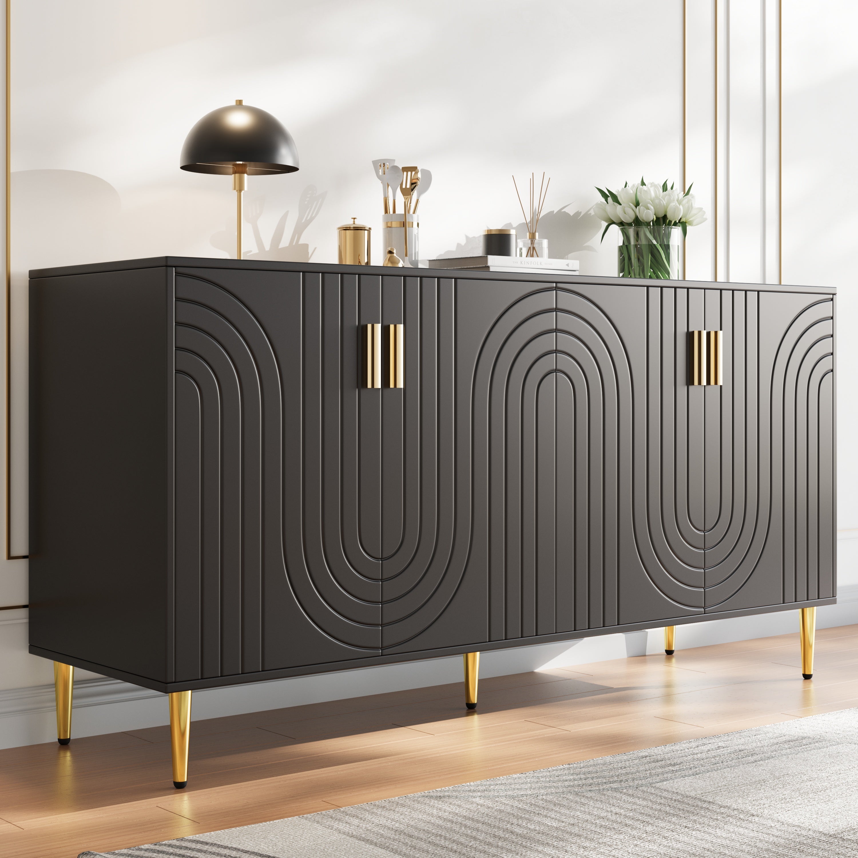 Black sideboard (152 x 40 x 75 cm) with unique wave design and golden handles and feet, creating an elegant dining area