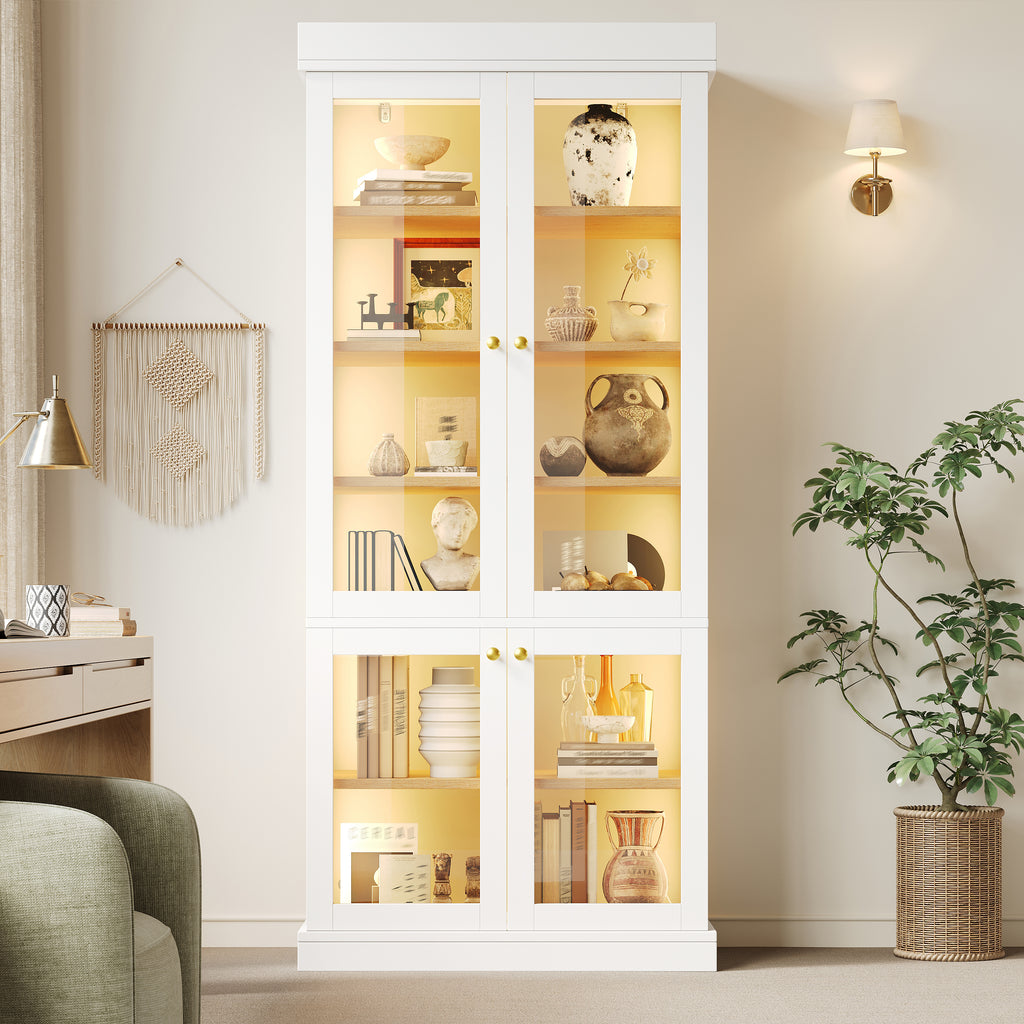 Modern freestanding cabinet with integrated LED mood lighting, glass display case, well-designed interior layout and anti-tip protection; stable, safe and versatile for the home; white.