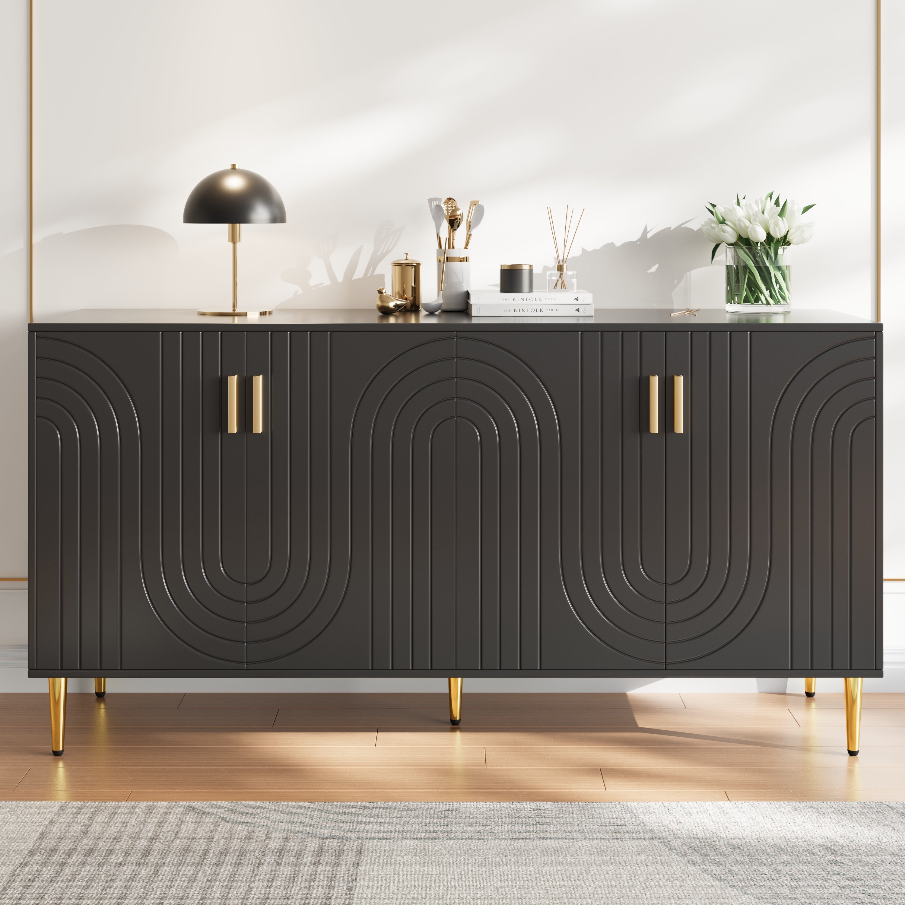 Black sideboard (152 x 40 x 75 cm) with unique wave design and golden handles and feet, creating an elegant dining area