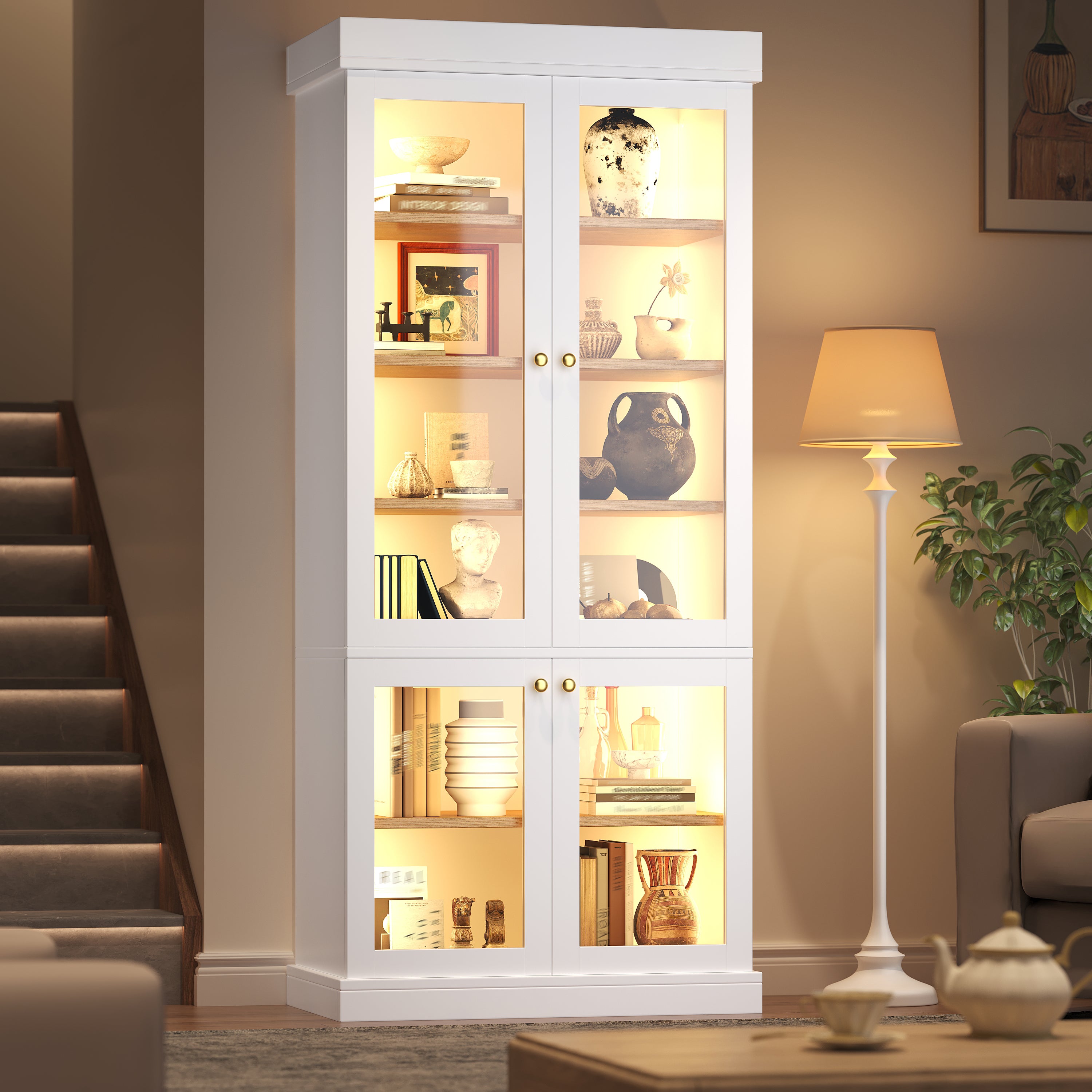 Modern freestanding cabinet with integrated LED mood lighting, glass display case, well-designed interior layout and anti-tip protection; stable, safe and versatile for the home; white.